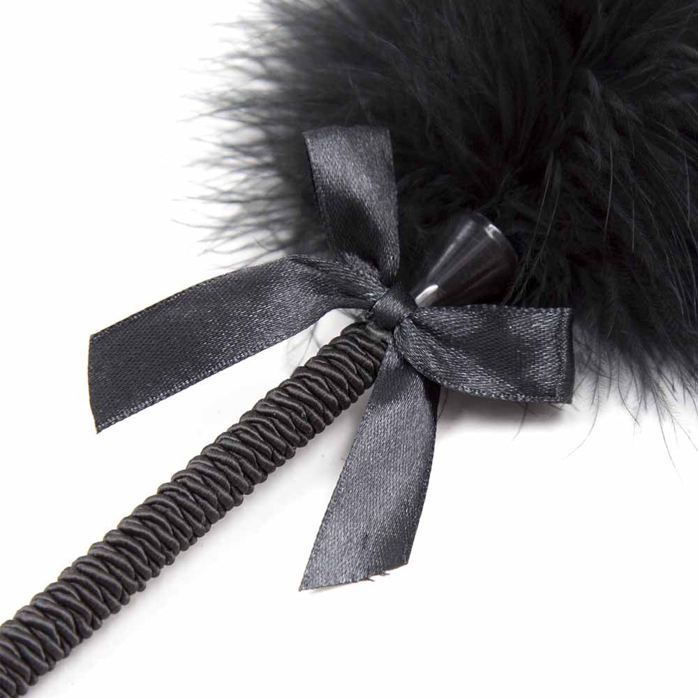Plumeau érotique avec Noeuds 25cm
