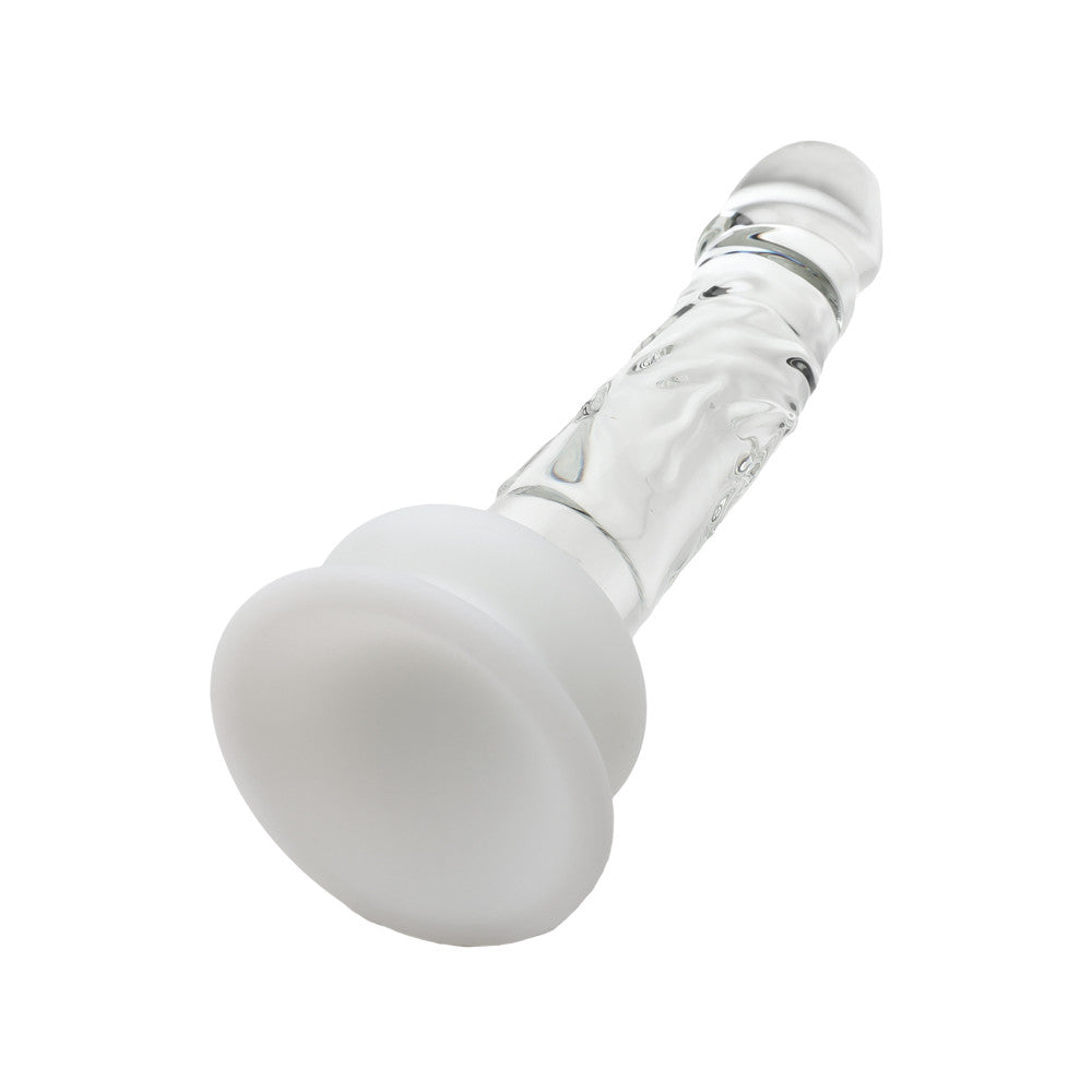 Gode en verre transparent avec socle blanc, vue du dessous