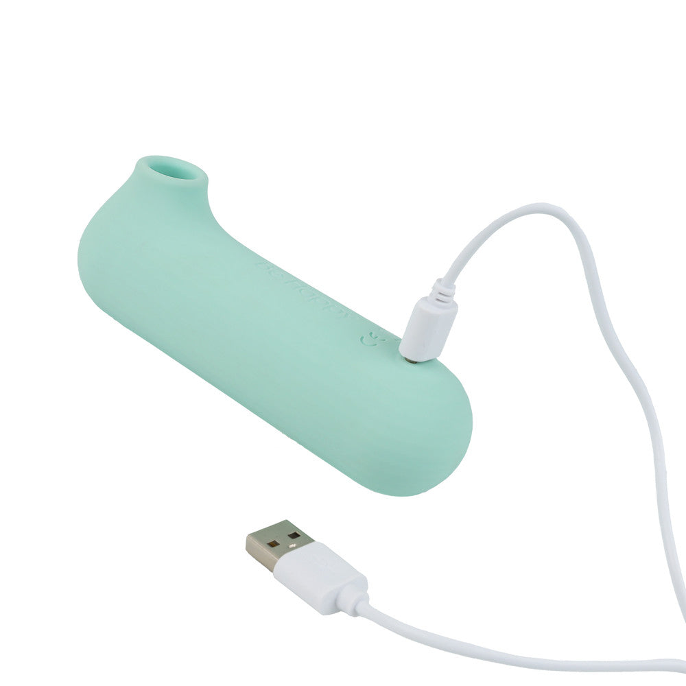 stimulateur clitoridien contact bleu en recharge avec cable usb