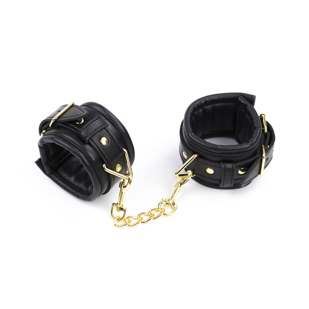 Be Bondage Entraves Poignets Cuir Noir et Métal Doré Réglables BDSM Vue Attachées avec Châine