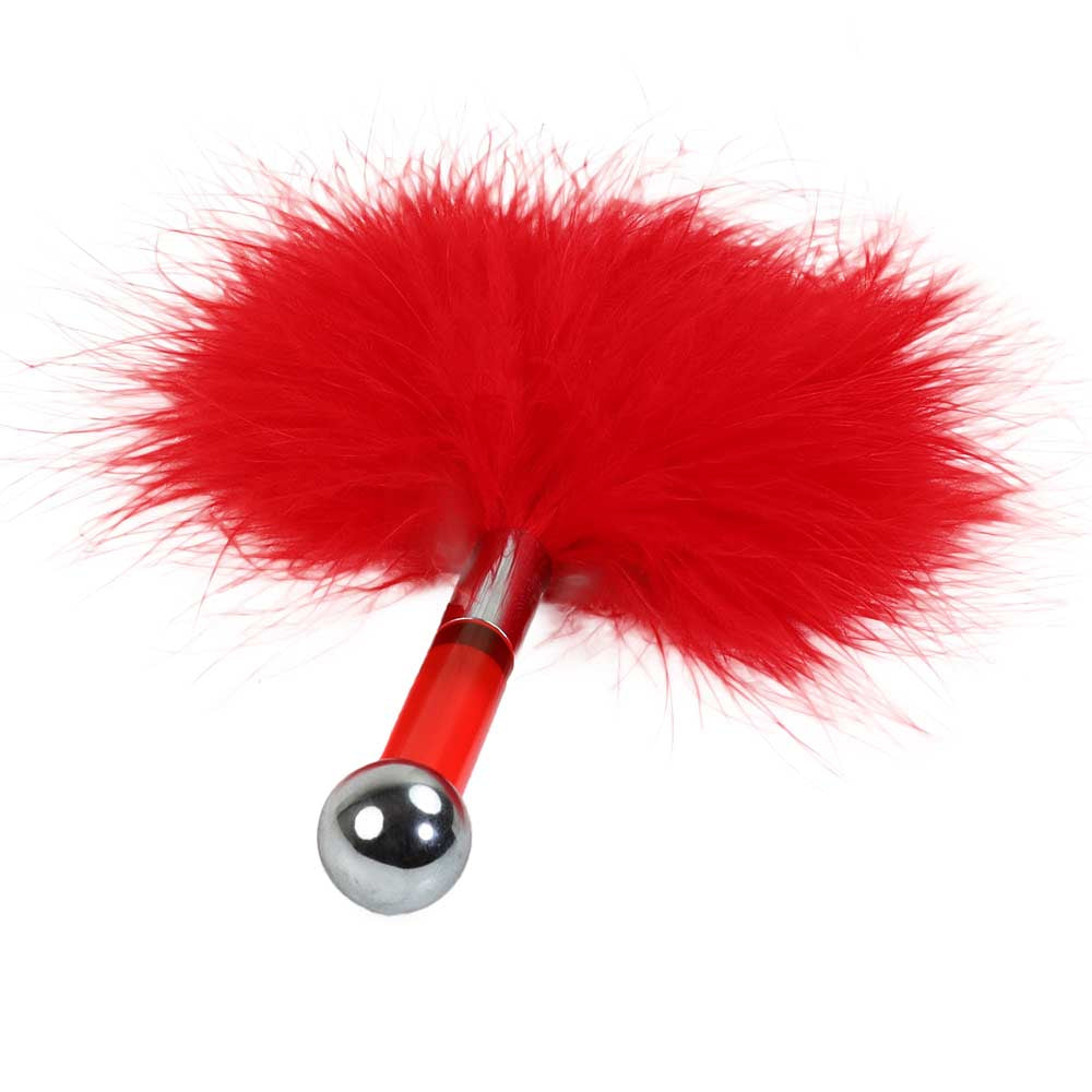 Petit plumeau Be Bondage rouge couché