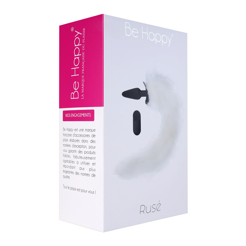 Plug noir avec une queue blanche avec sa petite télécommande noire de contrôle
