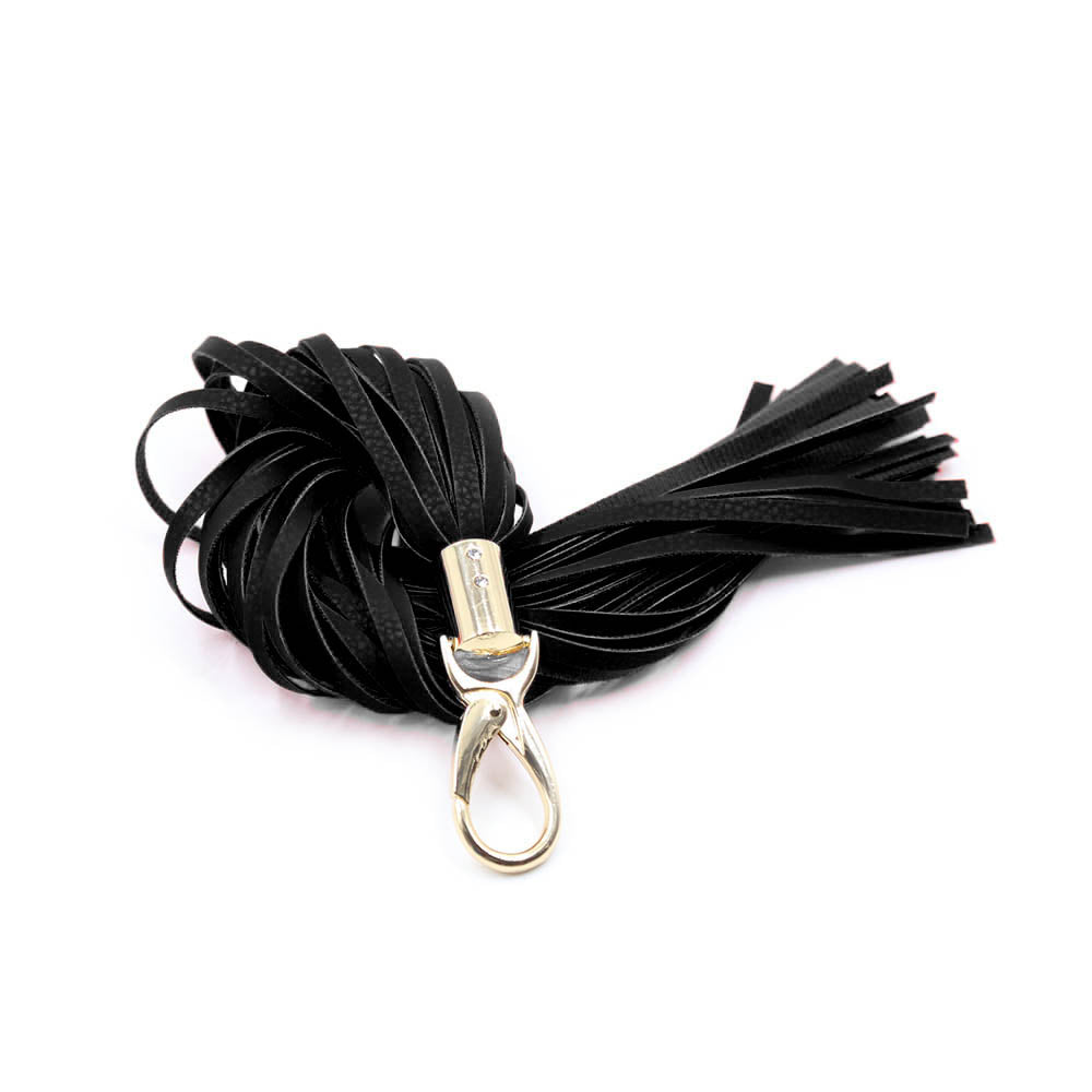 Be Bondage Petit Porte Clé Fouet Similicuir Noir Doré Plié